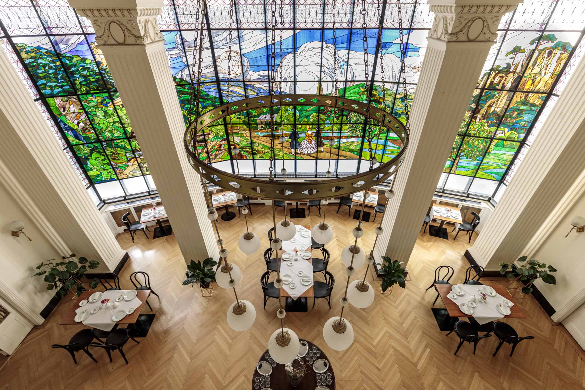 Hotel Herzoghof — iconic stained glass room, aerial view